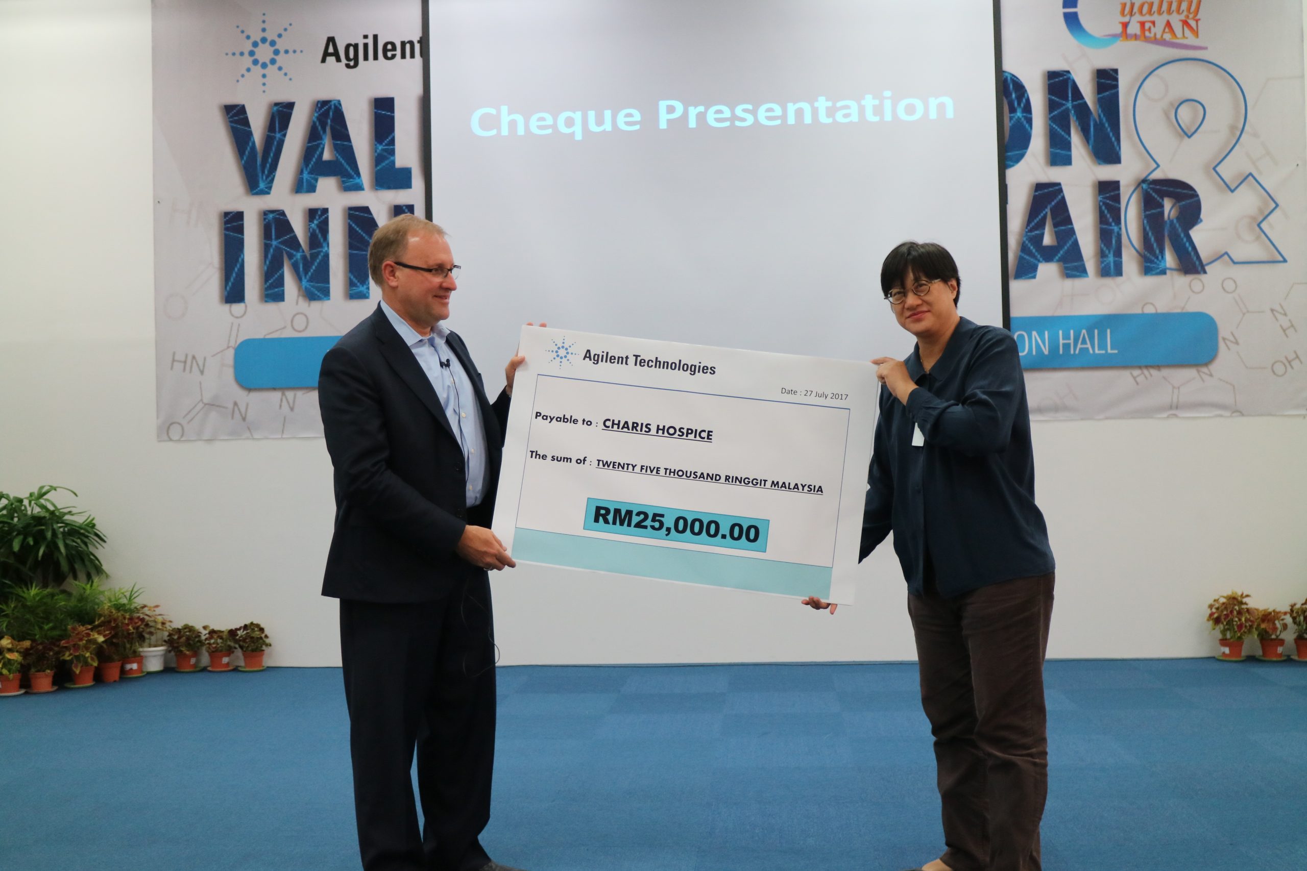 Cheque presentation at Agilent Technologies for “Adopt A Patient Project”